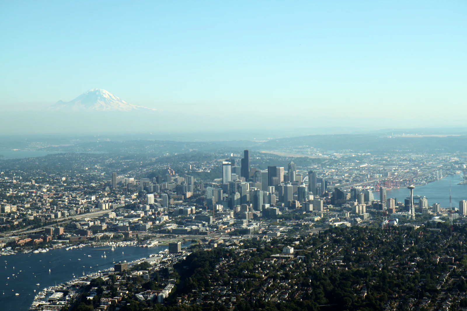 Seattle from above: Lake Union, the Space Needle and downtown, with Mount Rainier on the horizon.