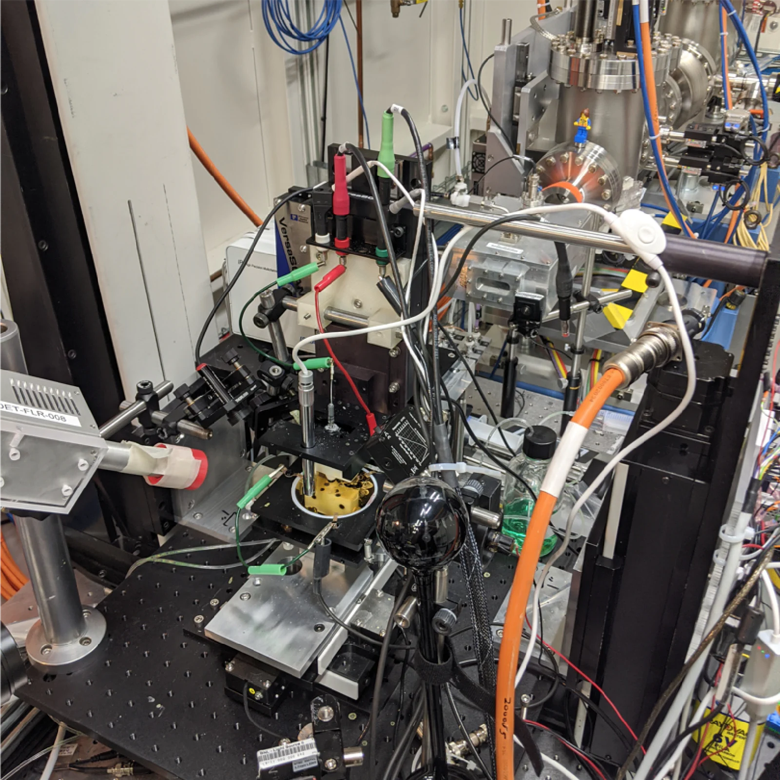 Robotic instruments, sensors and experimental equipment in NIST’s autonomous alloy research setup.